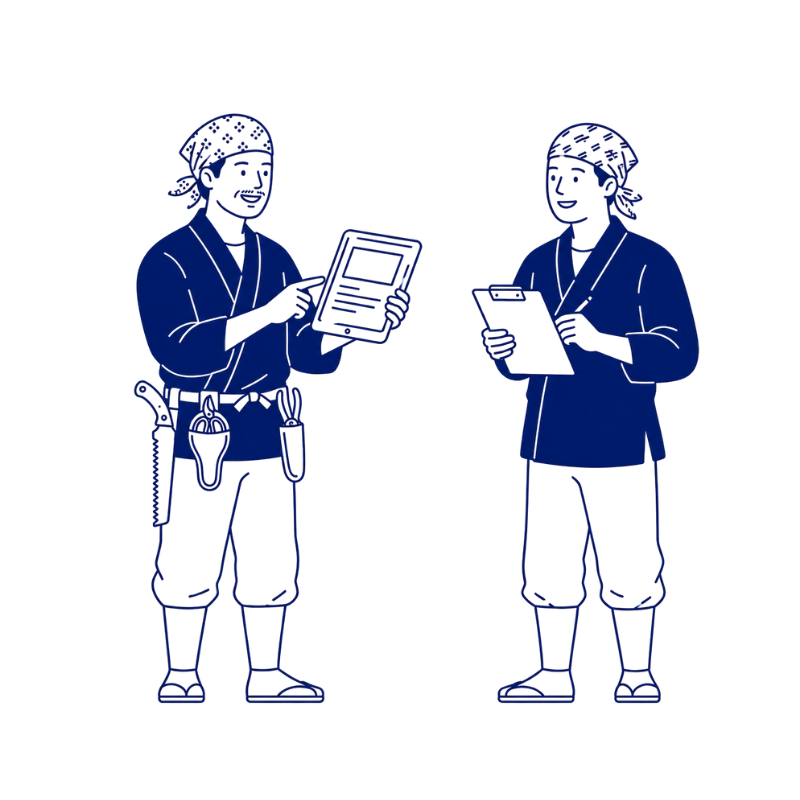 日本の庭師同士がタブレットを見ながら打ち合
